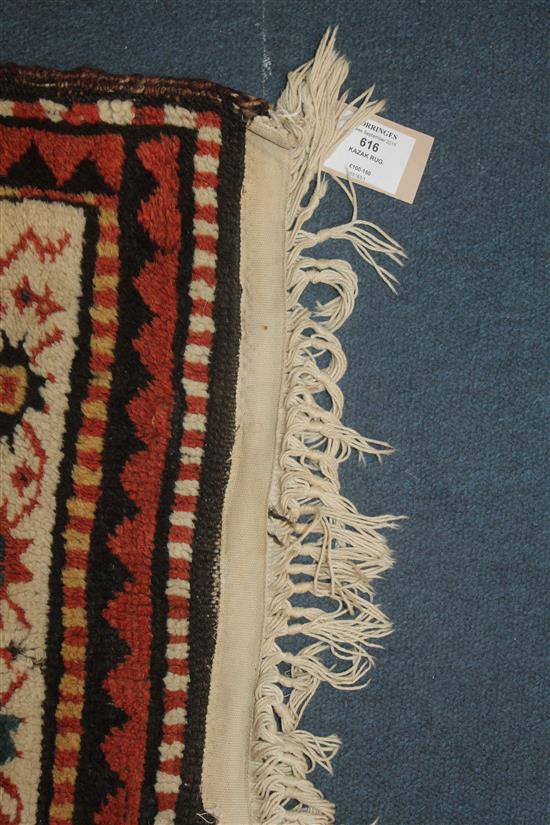 A Kazak rug, 6ft by 4ft 10in.